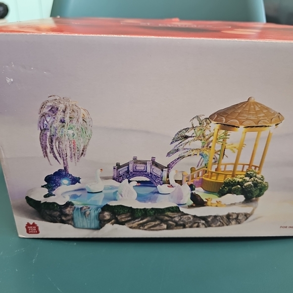 NIB St. Nicholas Square Village Swan Pond Christmas Decor Lights Music & Motion - Picture 2 of 9